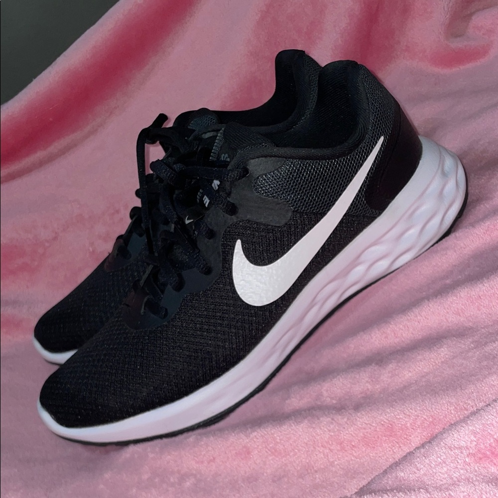 Nike Revolution 6 running shoes. Women's size 8.5. Like New.